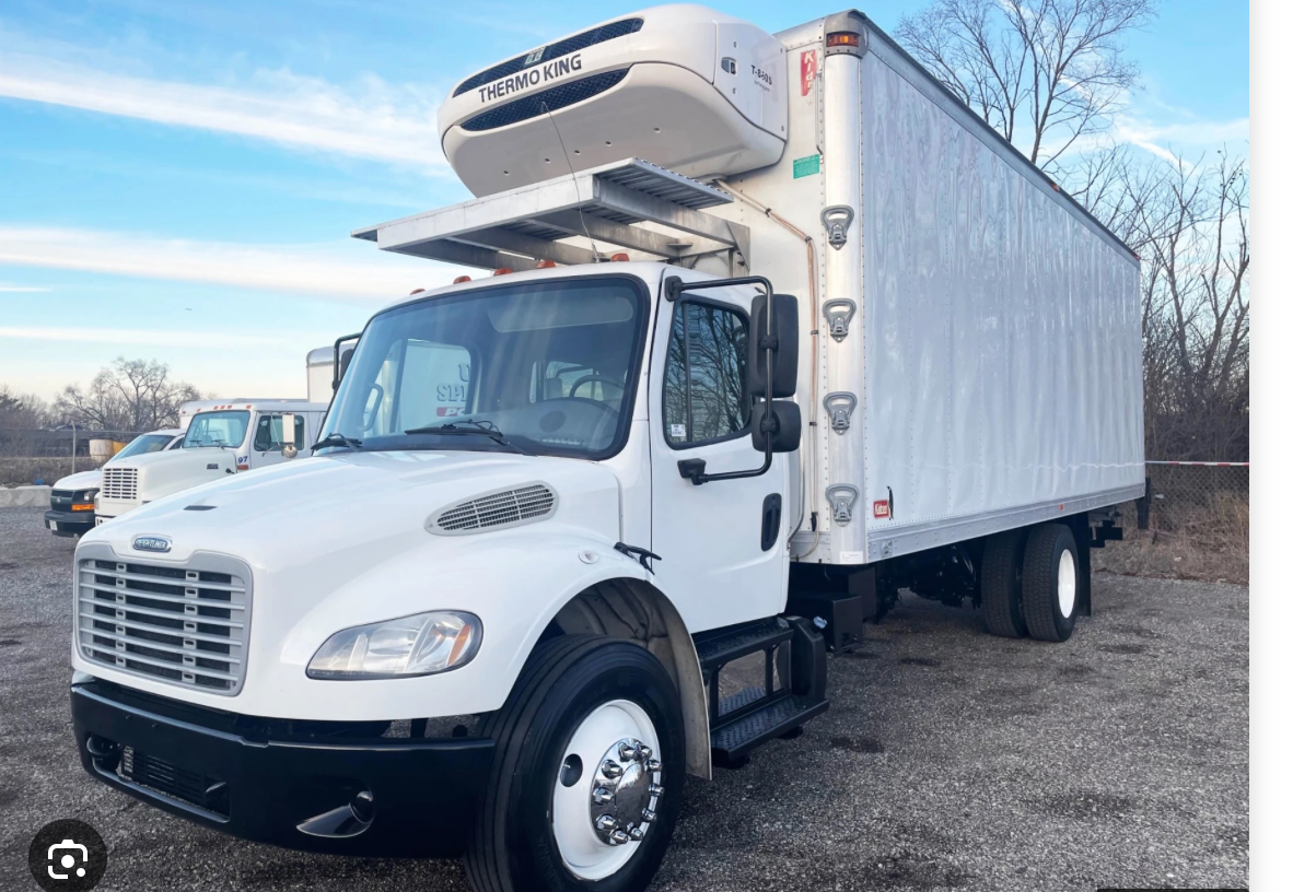 White refrigerated box truck ready for delivery